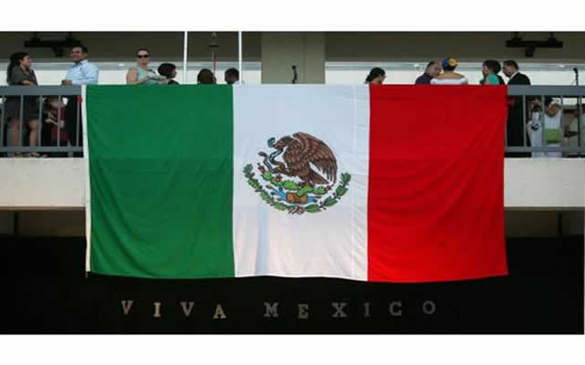 A Mexican flag hangs on a balcony occupied by V.I P. guests attending a Mexican Independence Day celebration at Cal State San Bernardino on Monday, Sept. 15, 2014 .