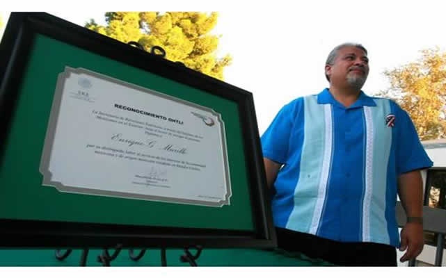 Enrique Murillo, a professor of education at Cal State San Bernardino, is this years recipient of Mexico's prestigious Ohtli award, presented to him during a Mexican Independence Day celebration at Cal State San Bernardino on Monday, Sept. 15, 2014. 